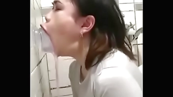 Asian deepthroating a dildo