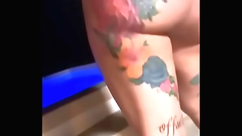 Cardi b yon a off colour bikini resembling chest with an increment of heavy arse